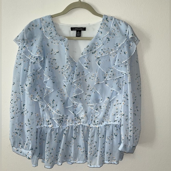 Blue floral ruffle top. 3/4 length sleeves. Brand is A love story. - Picture 3 of 4